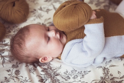 Trousseau de naissance en laine mérinos : douceur et protection en toutes saison