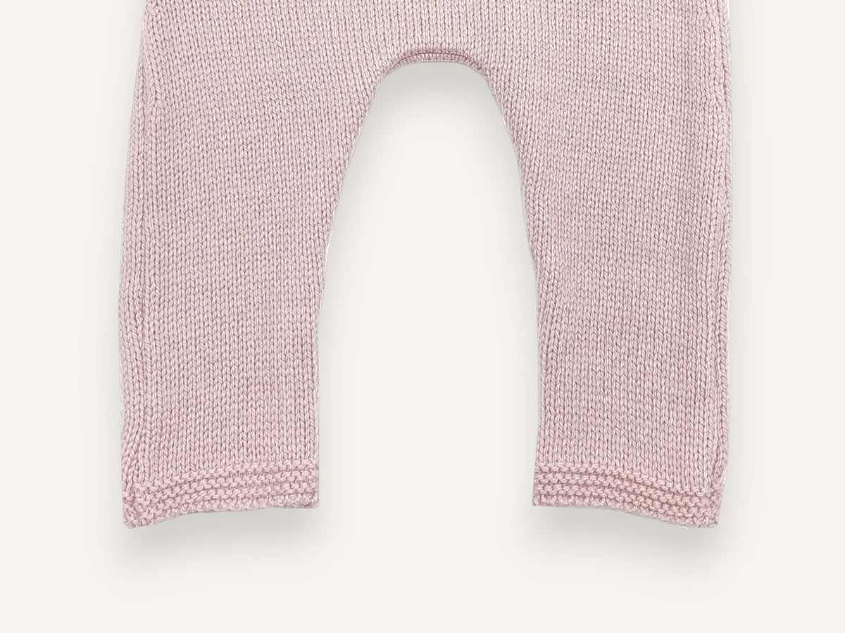 Close-up of the crotch and garter stitch finishes of the pink Chachou baby trousers