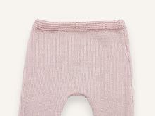 Close-up of the garter stitch waistband and jersey knit of the pink Chachou baby trousers