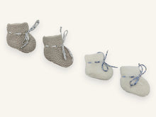 Cadeauset met twee paar babyslofjes in merinowol