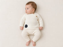 Bébé portant la brassière bébé Dadou écru