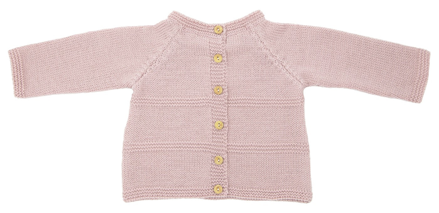 Vue du doutonnage dos d’une brassière pour prématuré en laine mérinos rose
