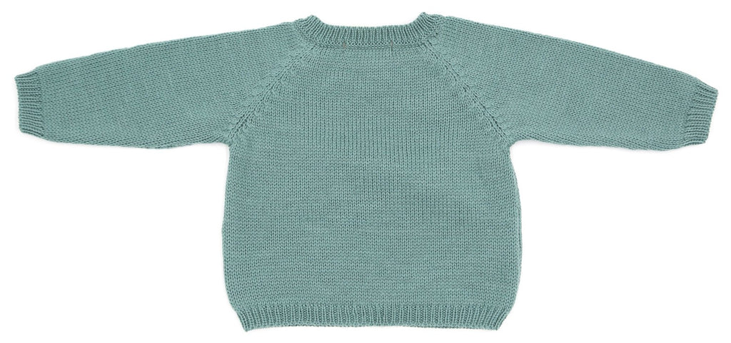 Vue de dos d’un pull bébé en laine mérinos vert